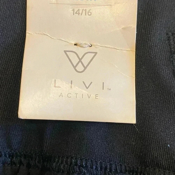 LIVI Active skirt with built in short. Adorable pleated detail in back 14/16 - Picture 6 of 6